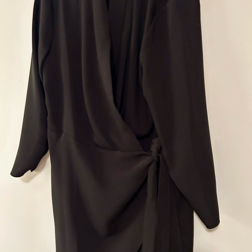 Elegant Black Women's cross over /wrap longer blazer.